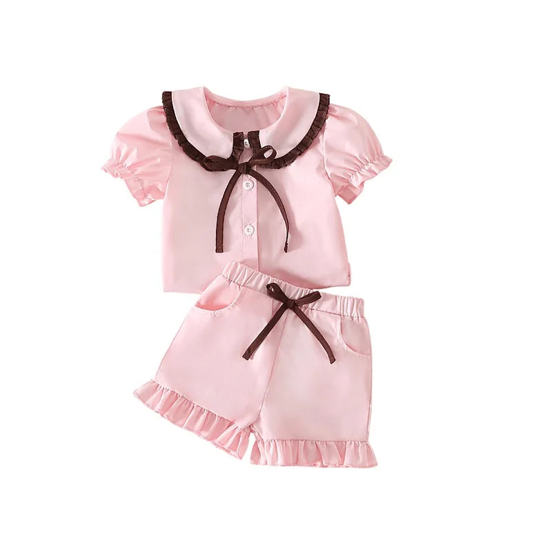 Girls Summer Pajama Set with Cute Doll Collar Short Sleeve Button Down Top and Ruffled Shorts Sleepwear in Vibrant Colors